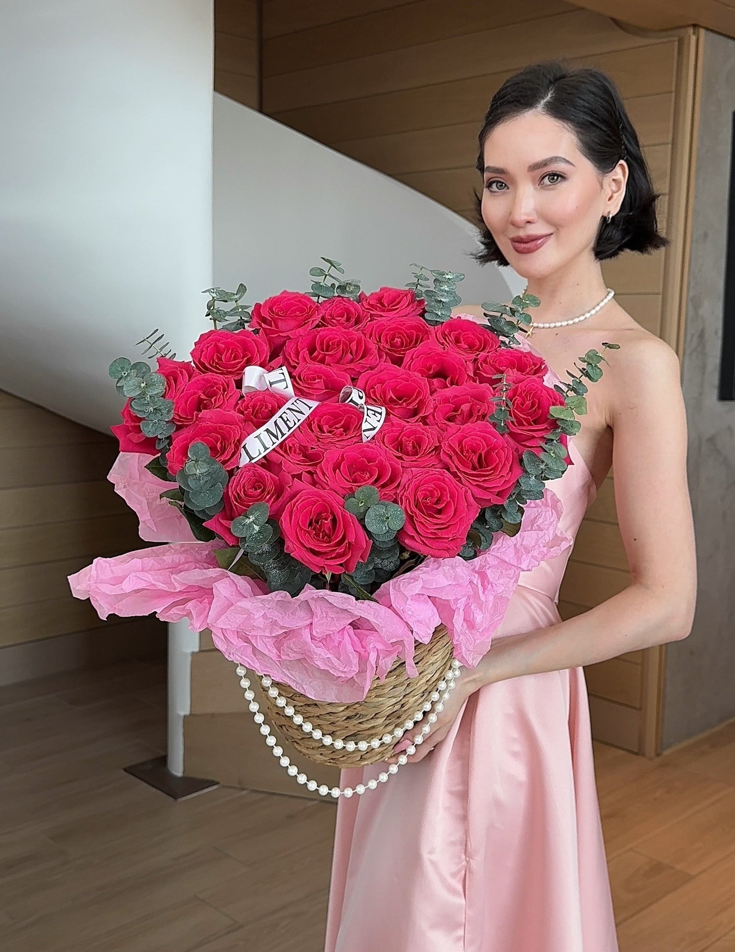 25 HOT PINK ROSES IN A BASKET