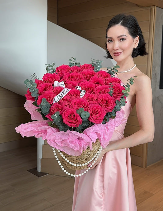 25 HOT PINK ROSES IN A BASKET