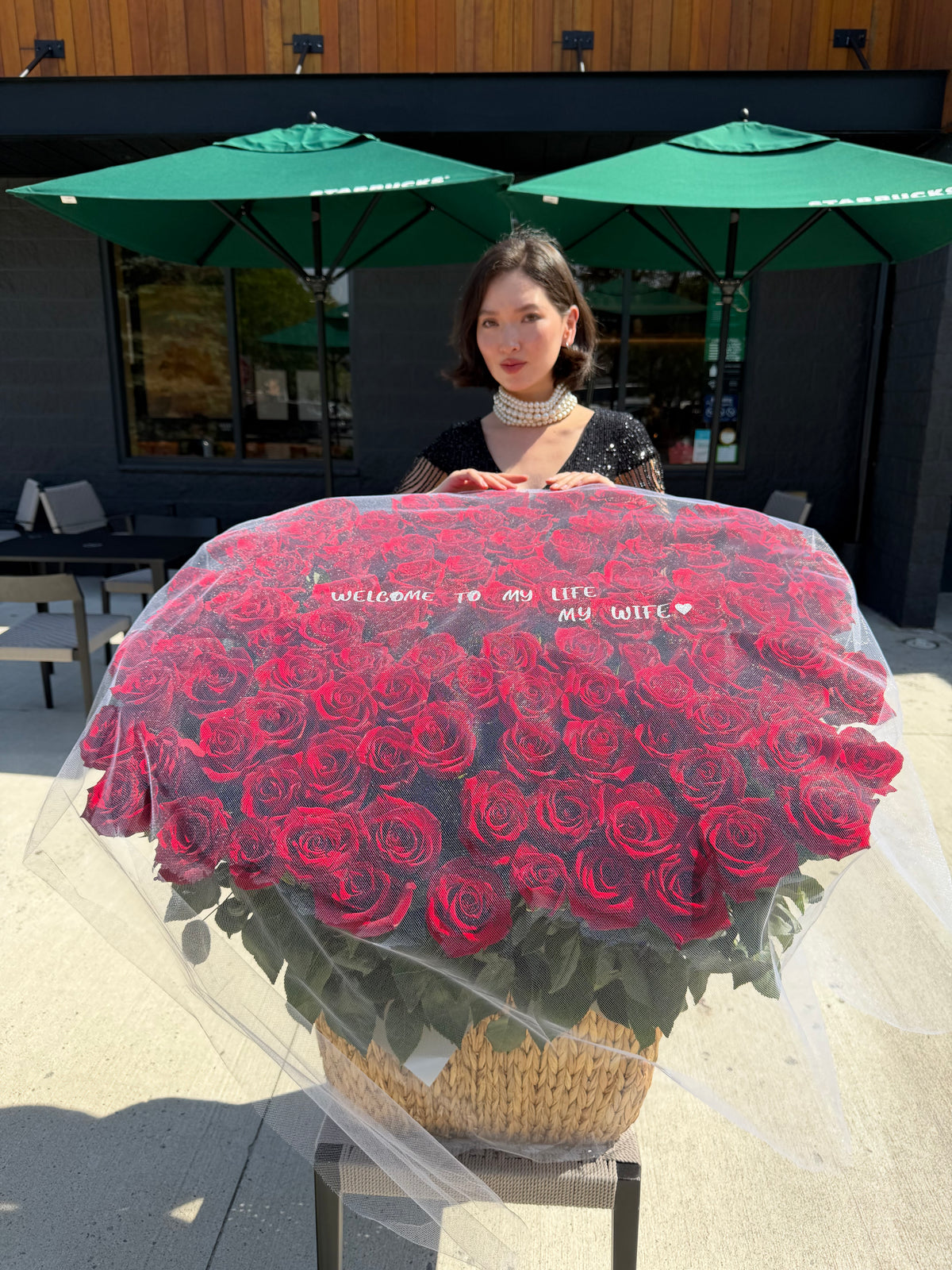 100 RED ROSES IN A BASKET