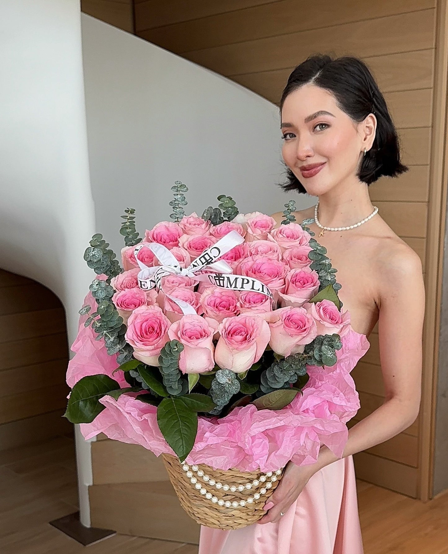 25 PINK ROSES IN A BASKET