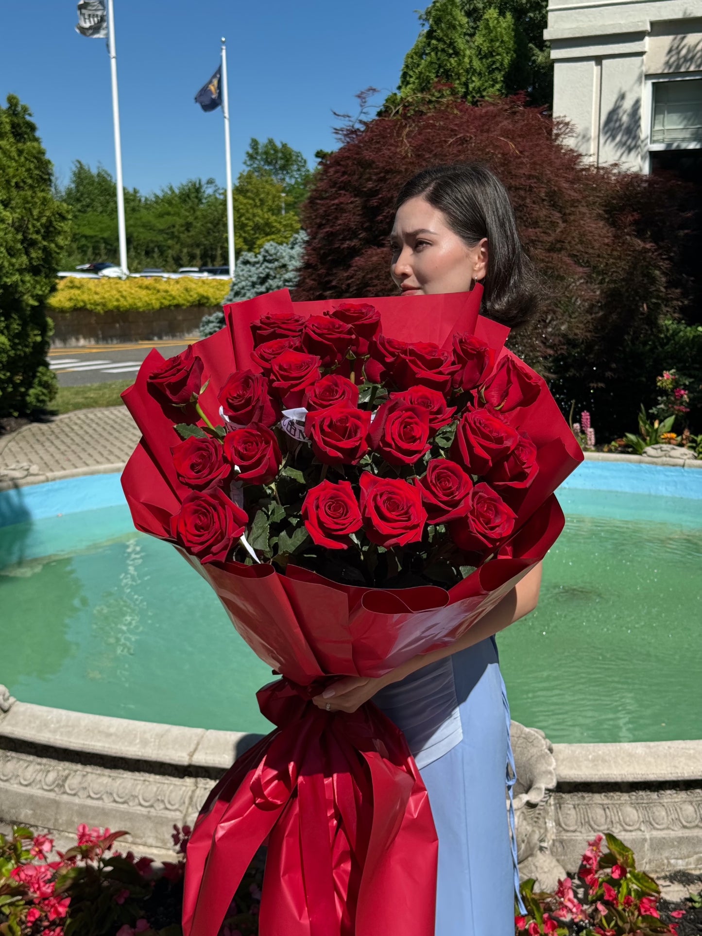 25 RED ROSES/ RED WRAPPING