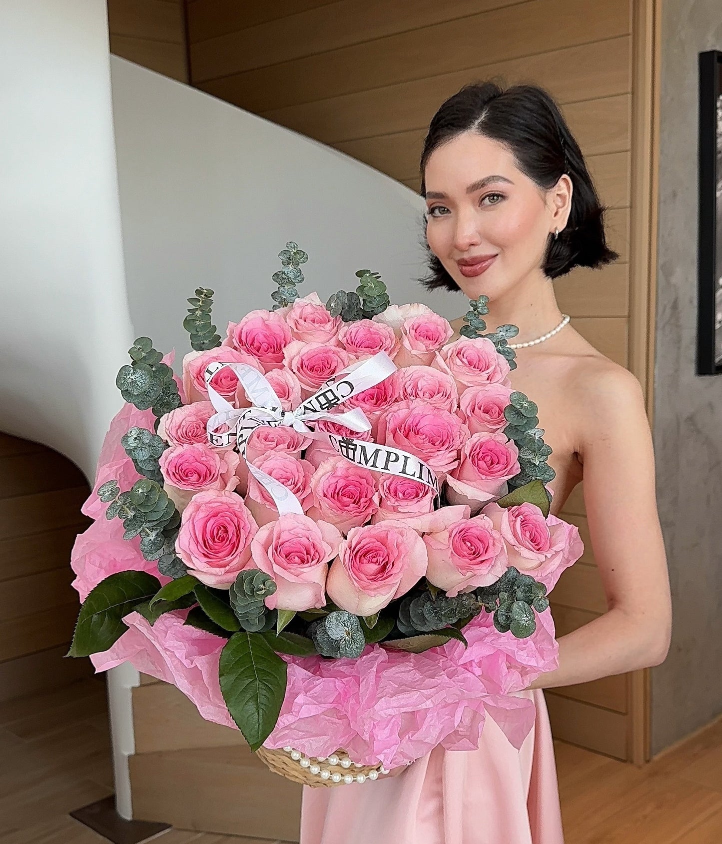 25 PINK ROSES IN A BASKET