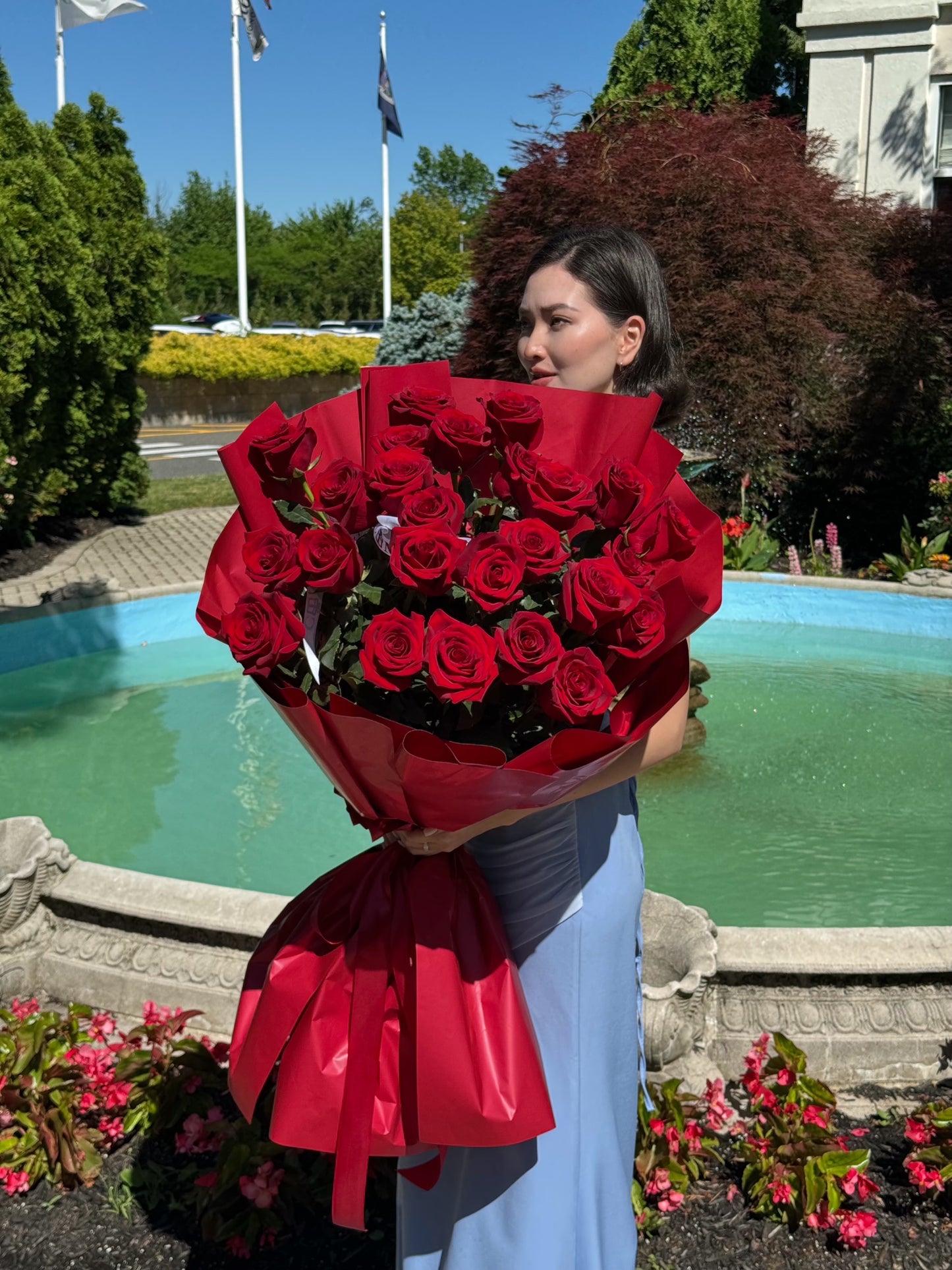 25 RED ROSES/ RED WRAPPING