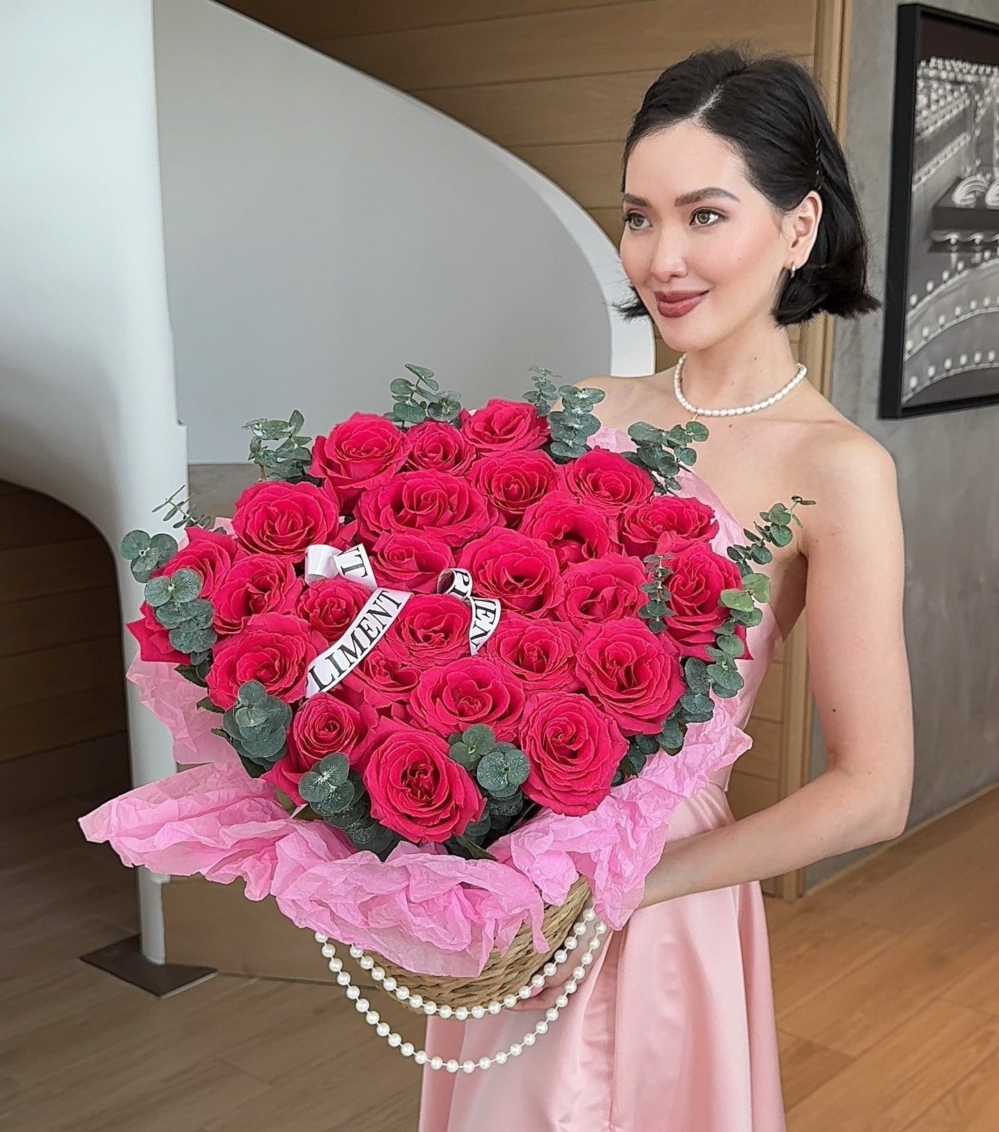 25 HOT PINK ROSES IN A BASKET