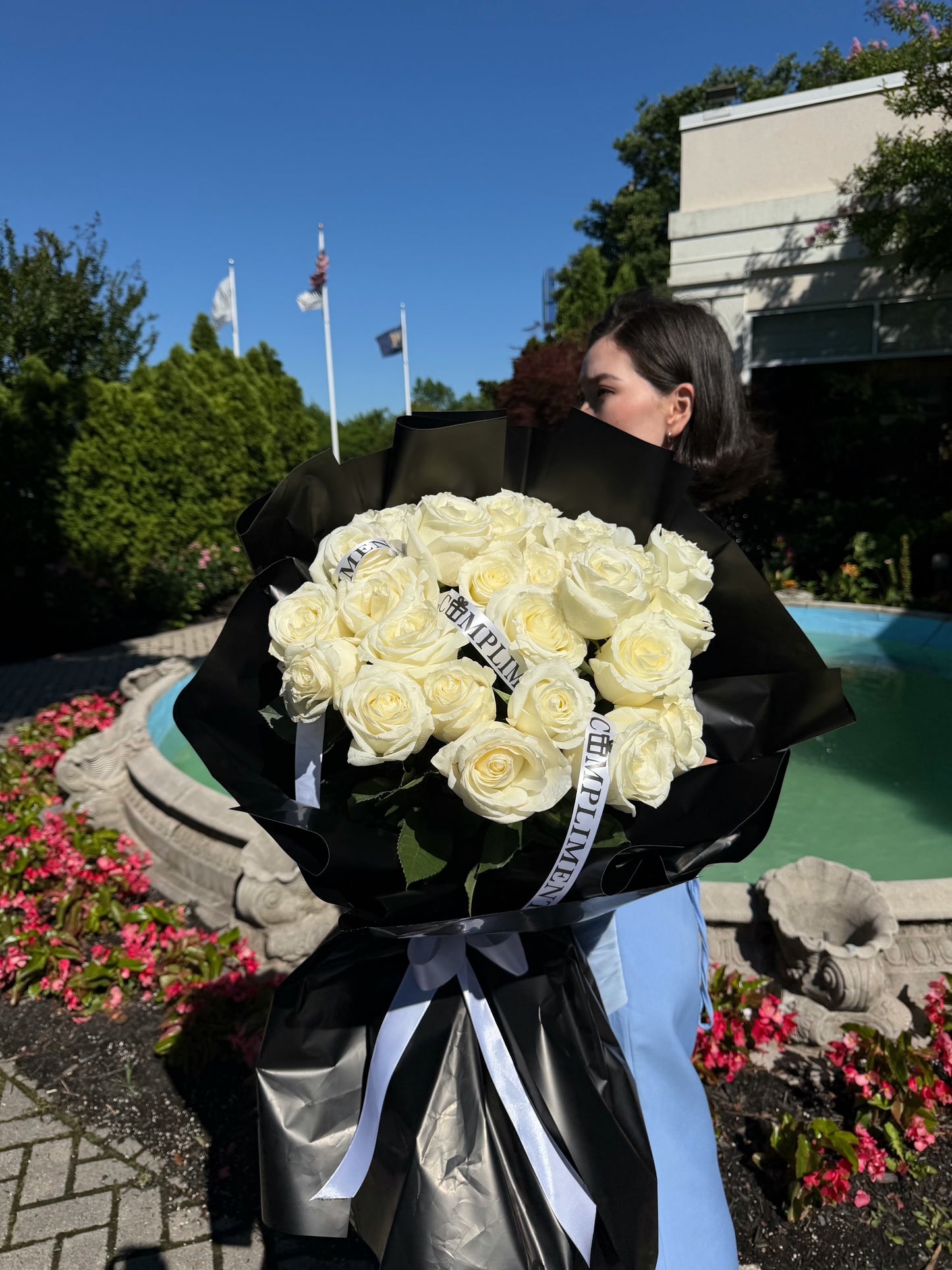 25 WHITE PEONY ROSES/ BLACK WRAPPING