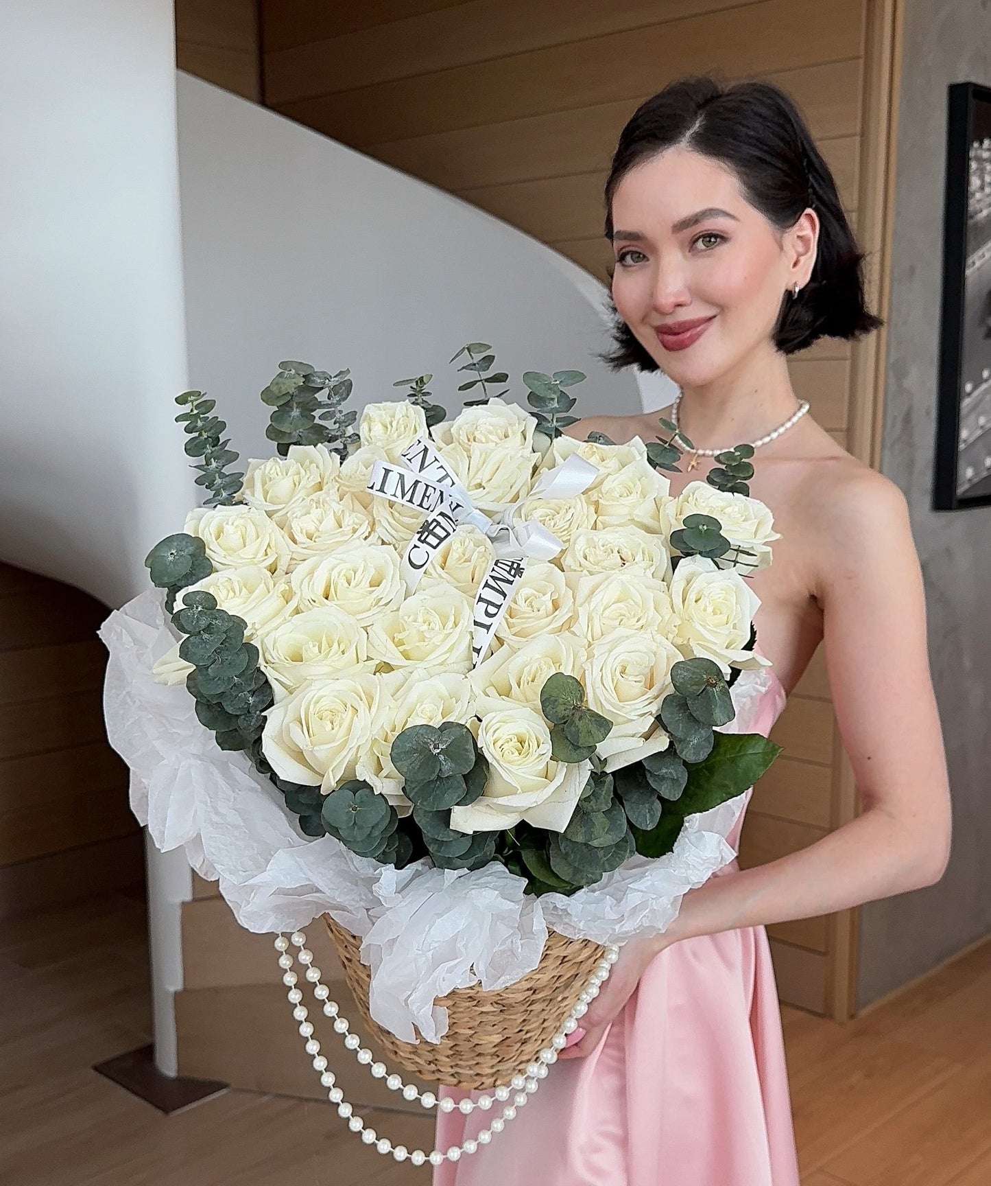 25 WHITE ROSES IN A BASKET